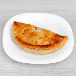 Golden-baked Chicken Tikka Pasty filled with tender chicken and aromatic spices.