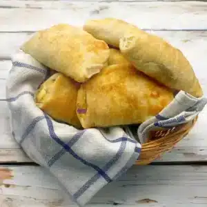 Our 12x Cocktail Cheese & Onion Pasties are perfect for parties, picnics, or snacking. Each mini pasty is filled with a rich blend of cheese and sweet onion, wrapped in our signature golden flaky pastry. Vegetarian-friendly and bursting with flavour, they’re ideal served warm or cold and guaranteed to be a crowd-pleaser.